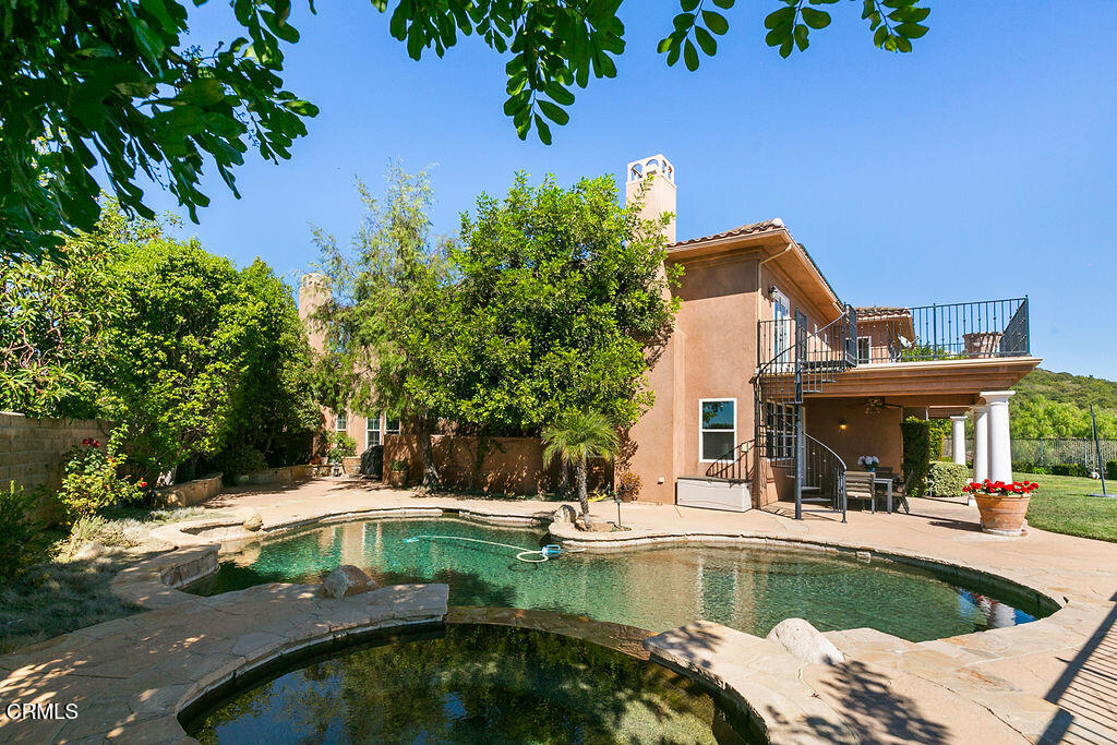 14216 Oneida Court Moorpark, CA 93021 - Photo 72 of 75 a view of a swimming pool with chairs