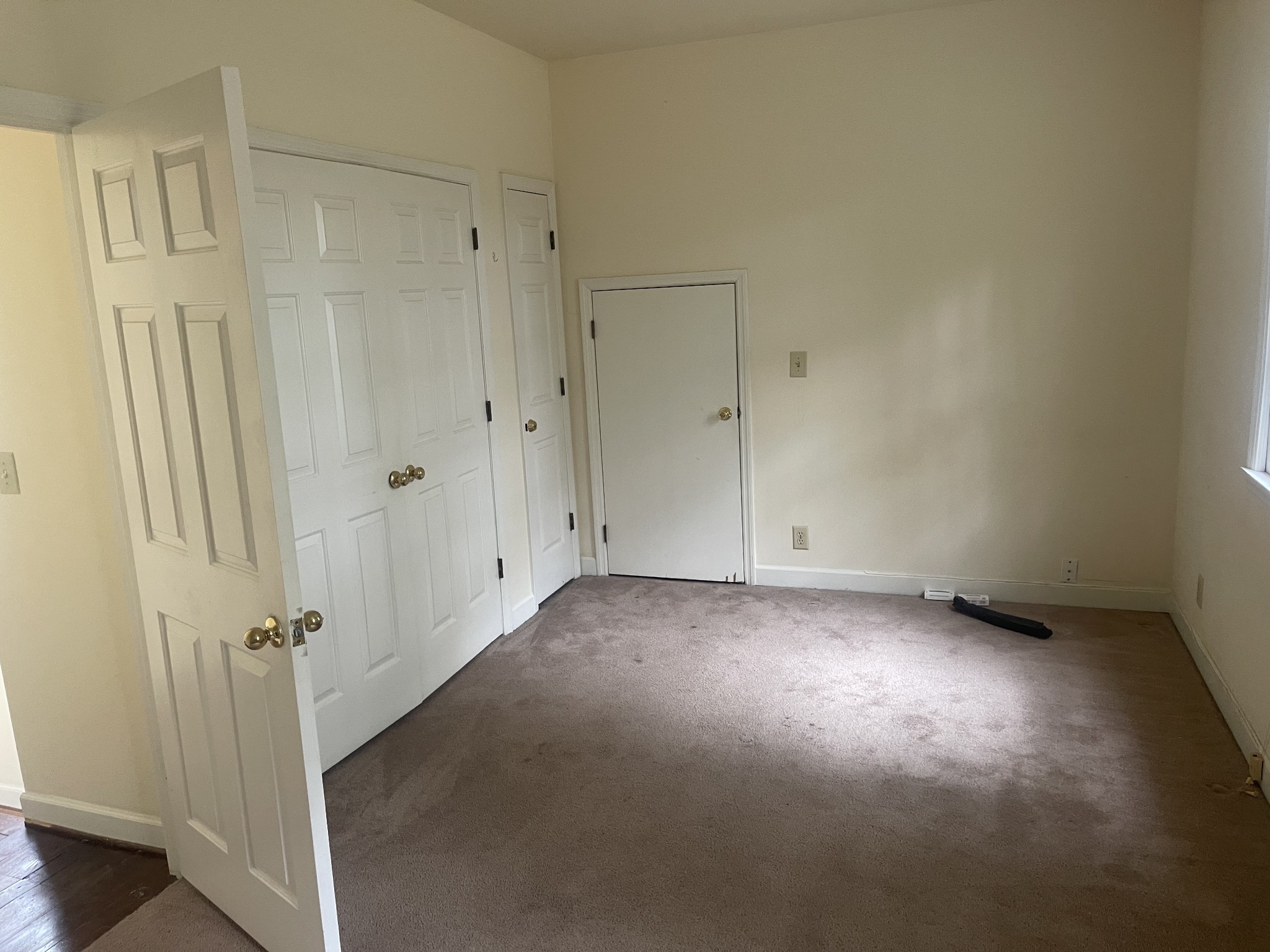 3088 Hillsboro Road Brentwood, TN 37027 - Photo 10 of 18 a view of a room with a wooden door