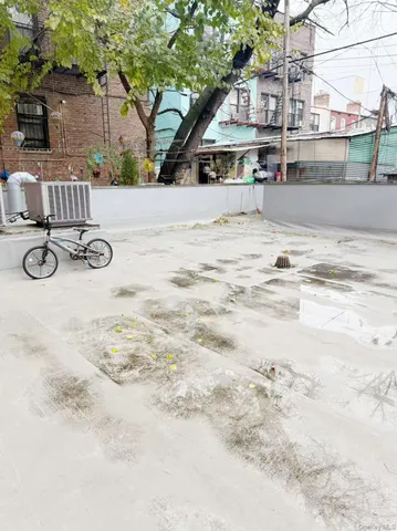 a view of swimming pool with seating space