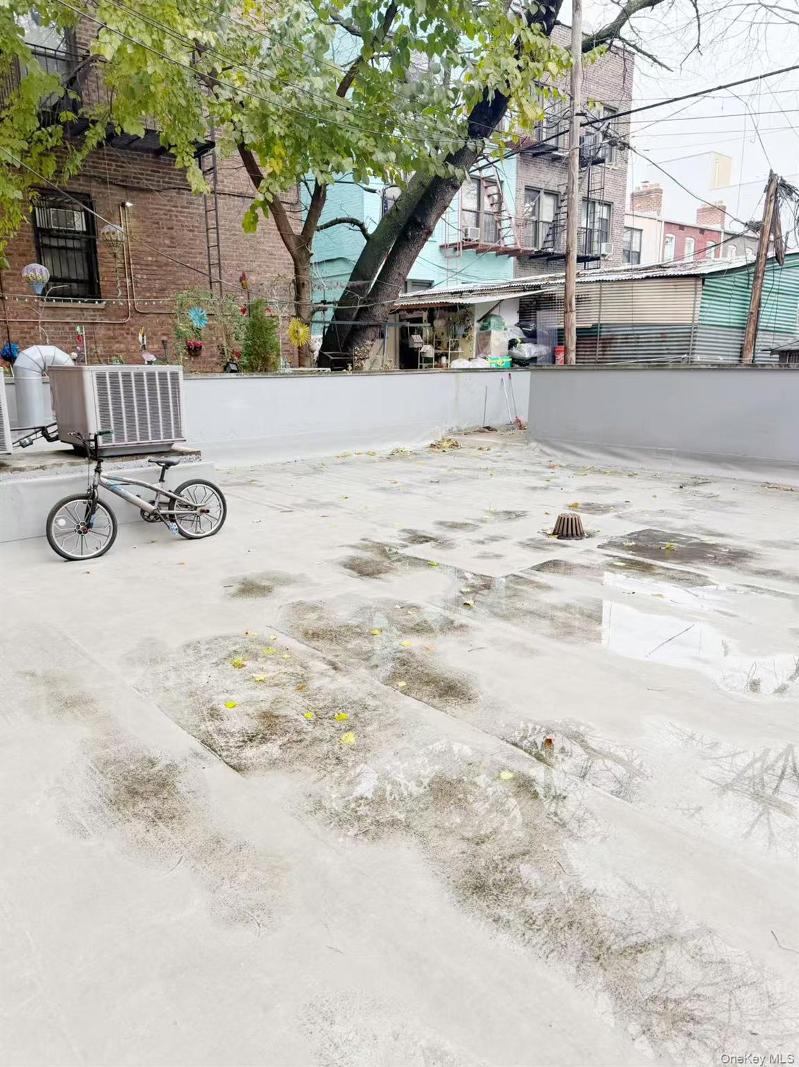 8510 Elmhurst Avenue, Unit 1C Queens, NY 11373 - Photo 2 of 9 a view of swimming pool with seating space