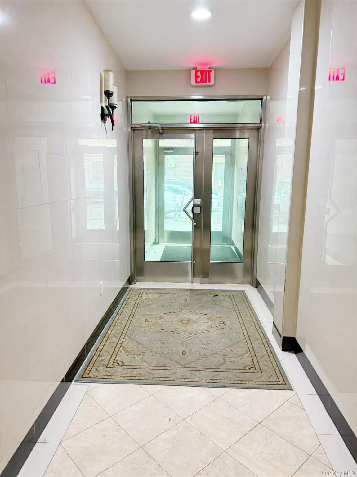 8510 Elmhurst Avenue, Unit 1C Queens, NY 11373 - Photo 4 of 9 a view of an entryway