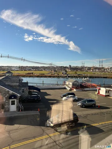 a bathroom with a shower and a sink