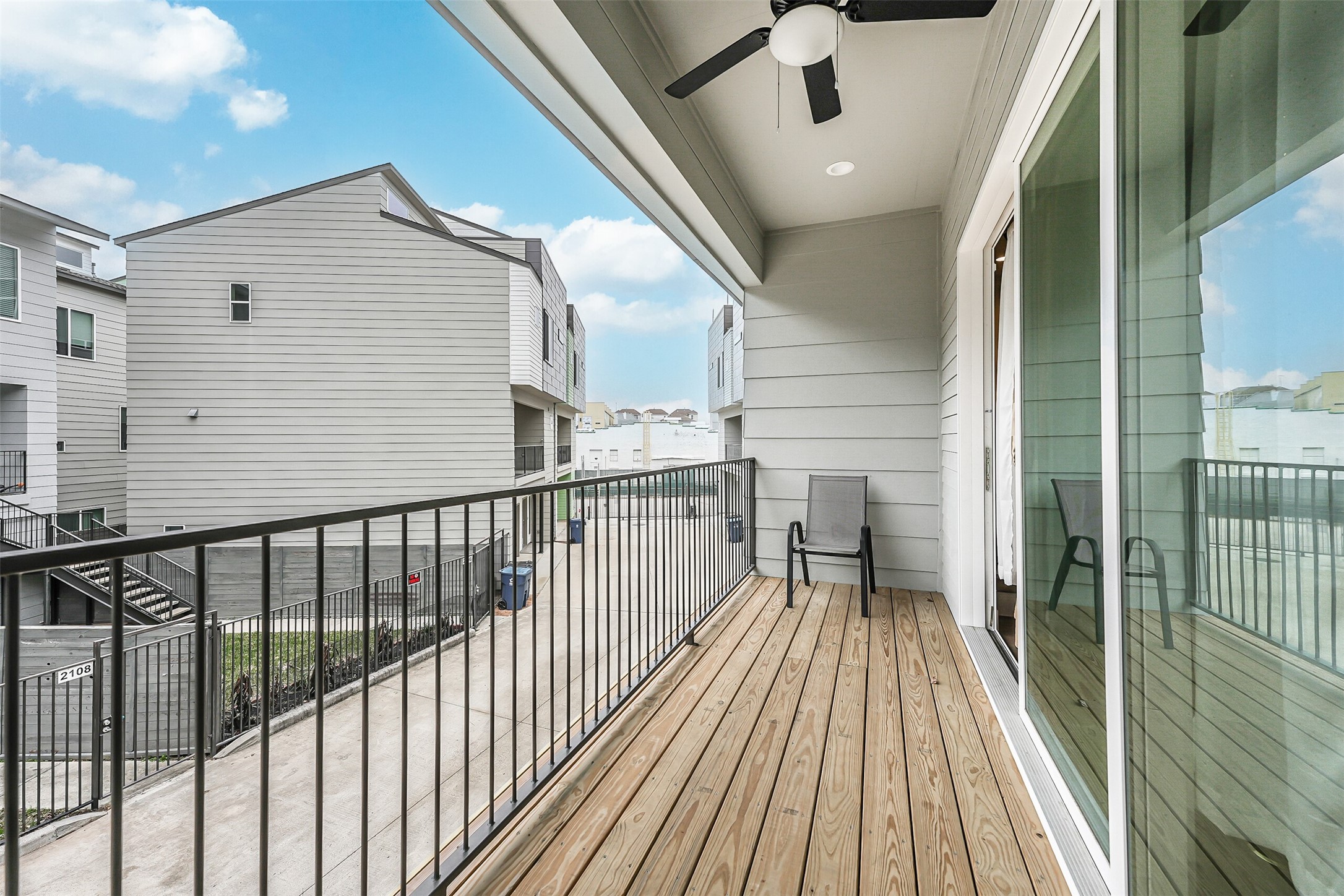 2136 Dennis Street Houston, TX 77004 - Photo 22 of 49 a view of a balcony with wooden floor