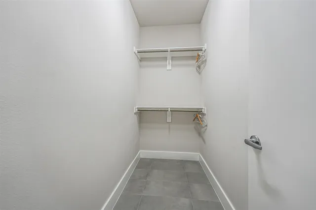 a view of a balcony with wooden floor