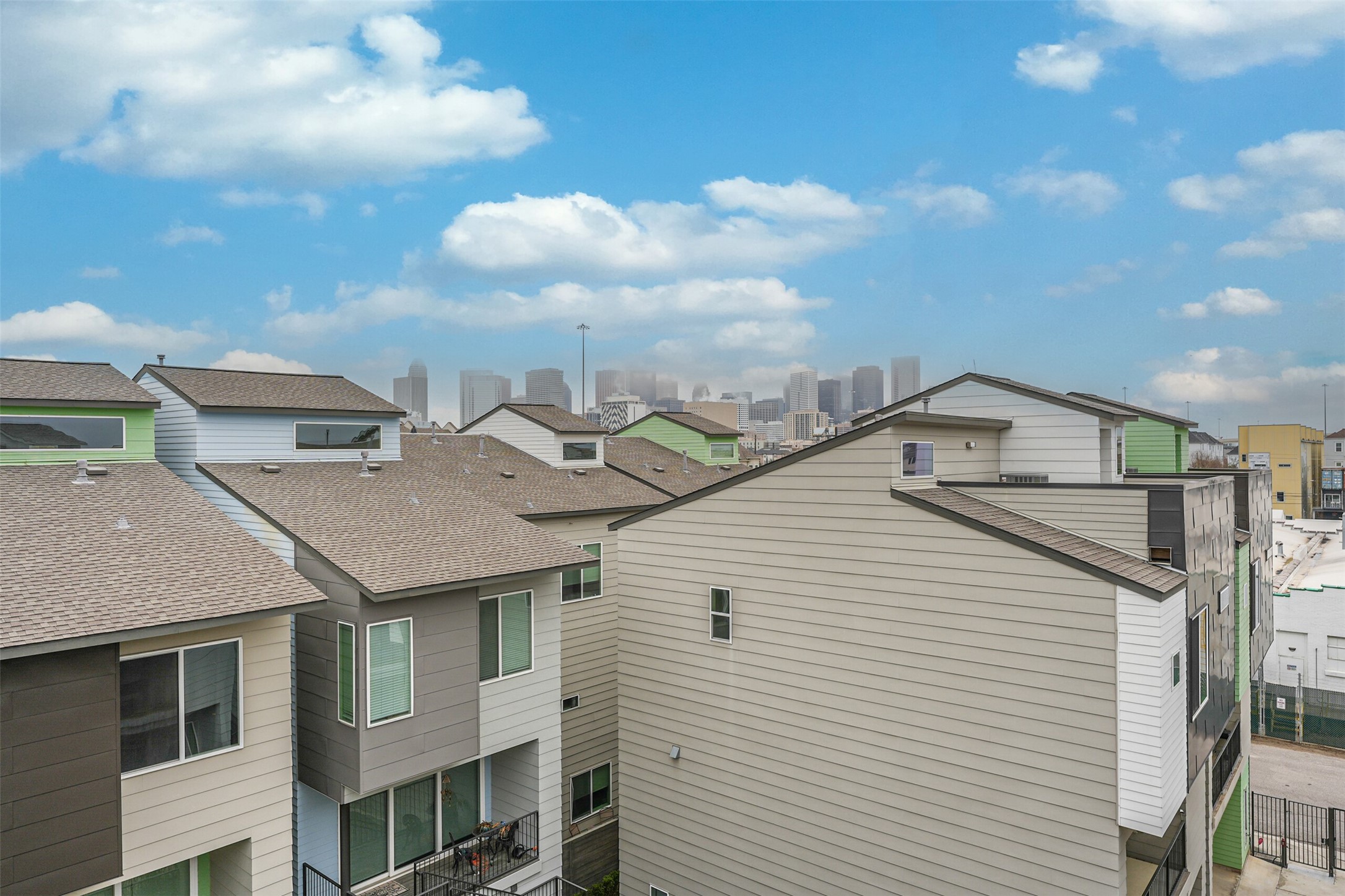 2136 Dennis Street Houston, TX 77004 - Photo 43 of 49 a view of a white house next to a yard