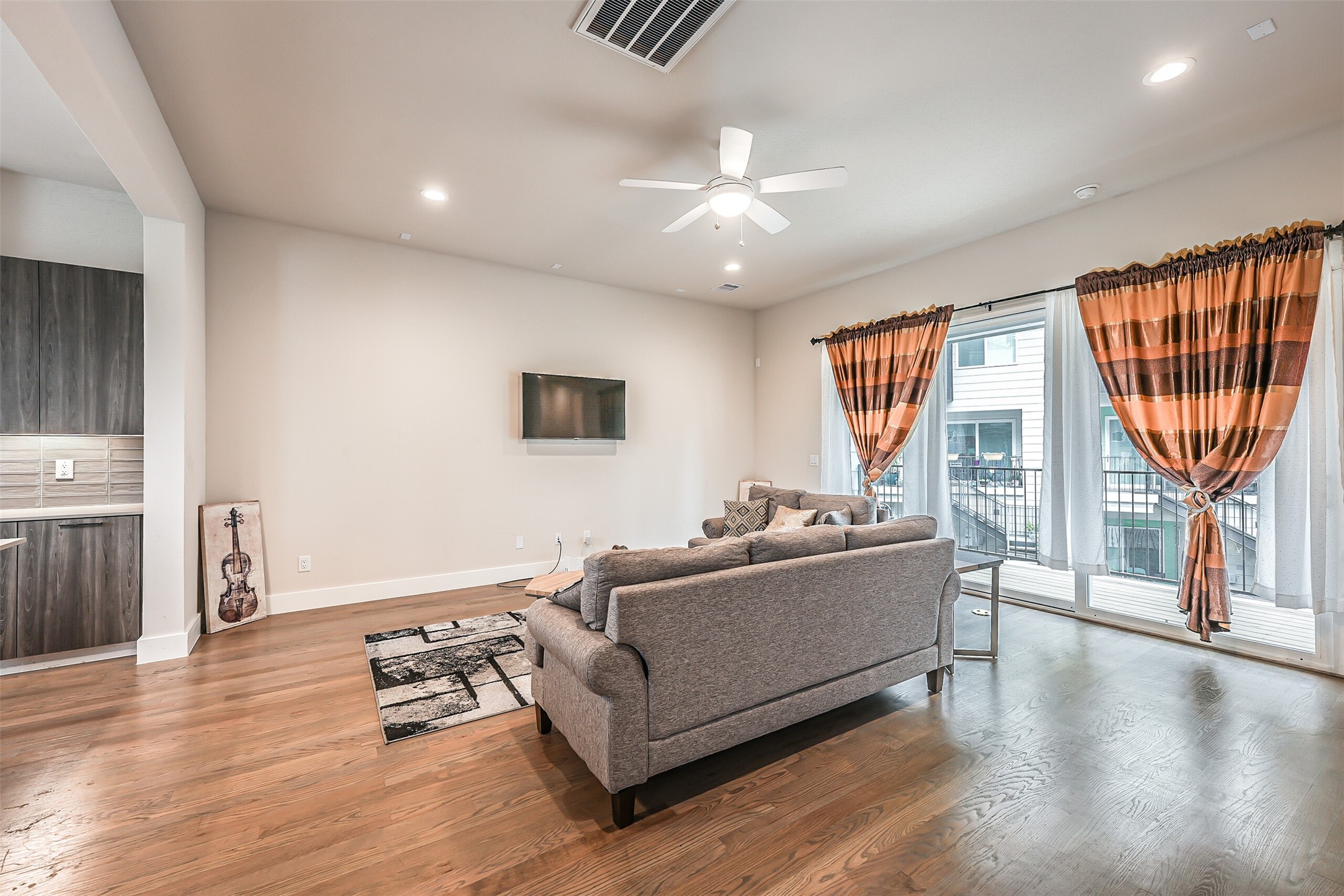 2136 Dennis Street Houston, TX 77004 - Photo 5 of 49 a living room with furniture and a large window