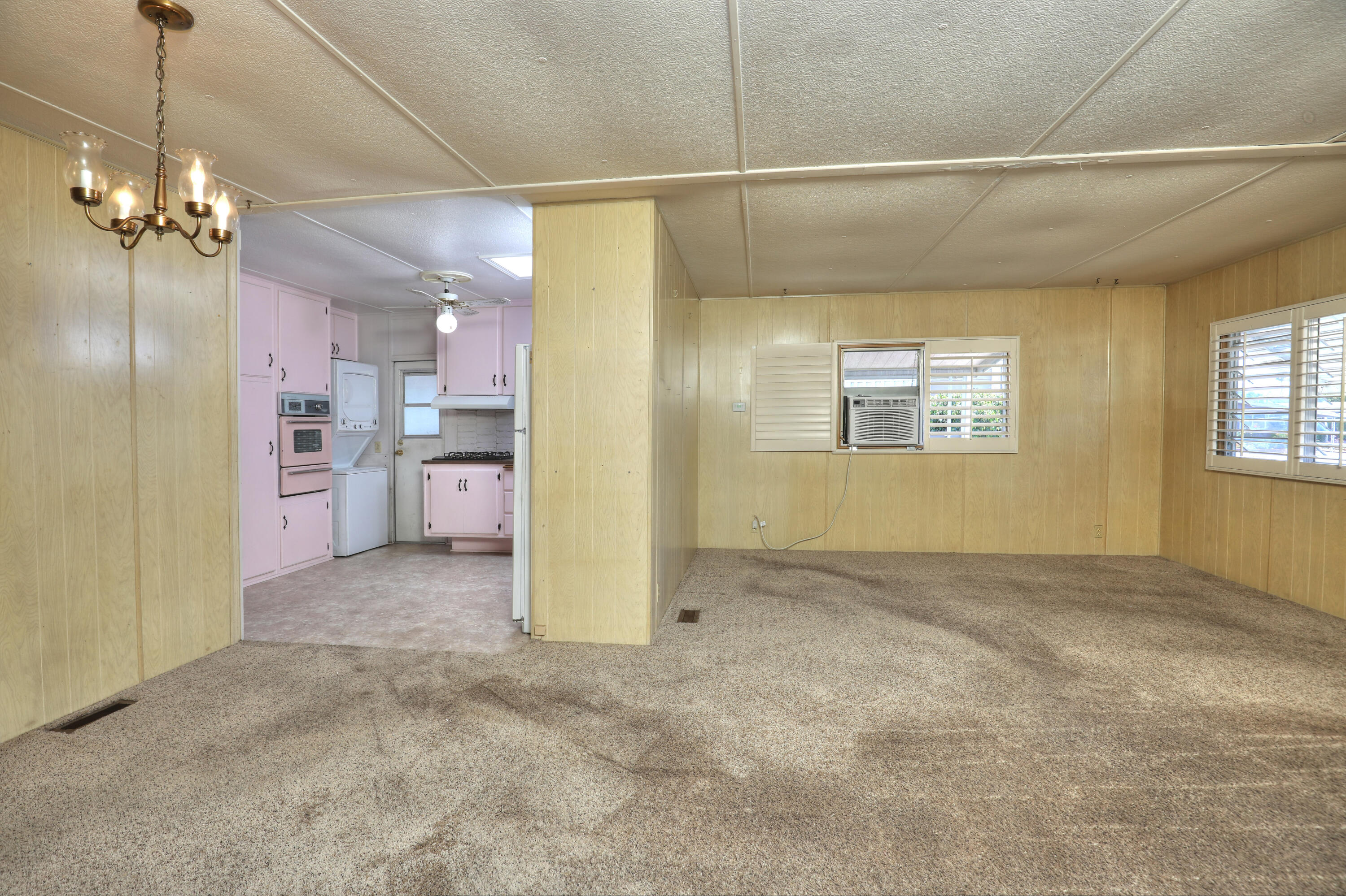 333 Old Mill Road, Unit 102 Santa Barbara, CA 93110 - Photo 2 of 16 a view of a kitchen with a refrigerator a kitchen view and a window