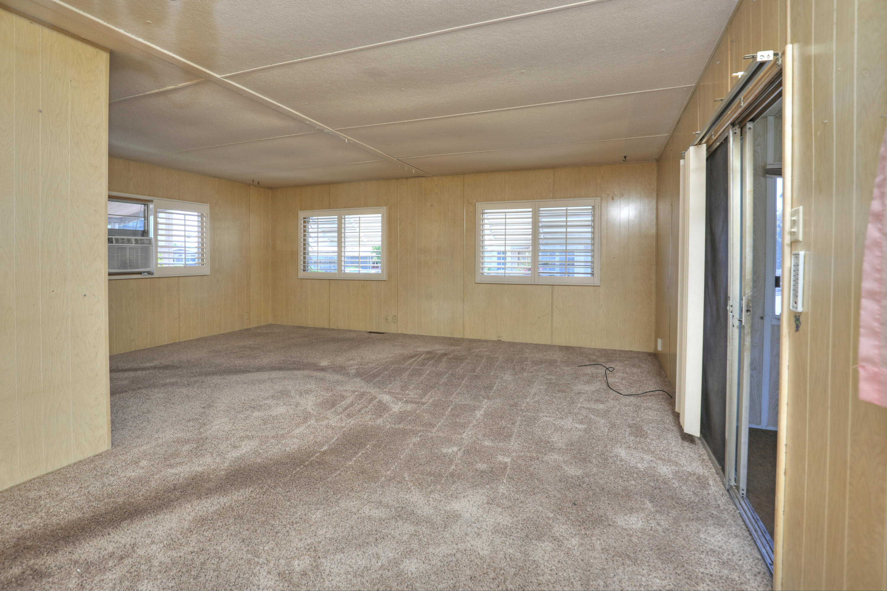 333 Old Mill Road, Unit 102 Santa Barbara, CA 93110 - Photo 5 of 16 an empty room with windows