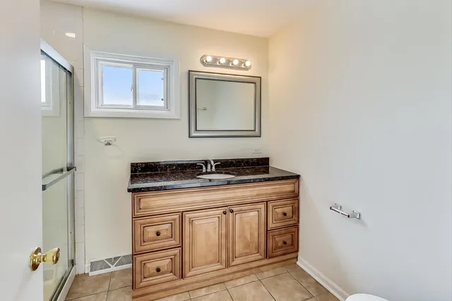 a view of a sink and a mirror