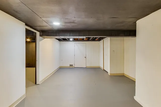 a view of hallway with closet