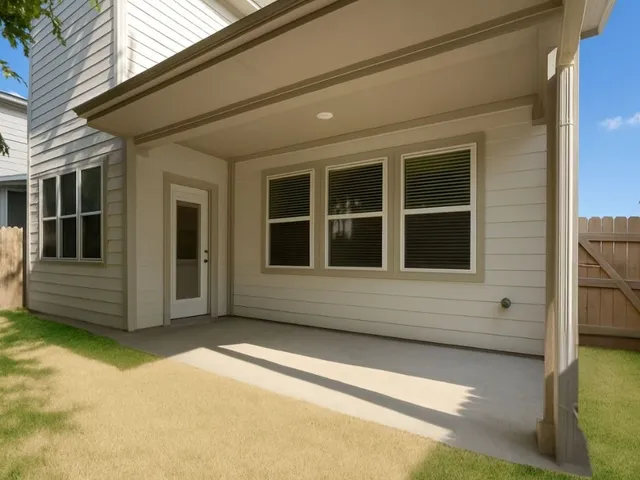 a view of entrance gate of a house