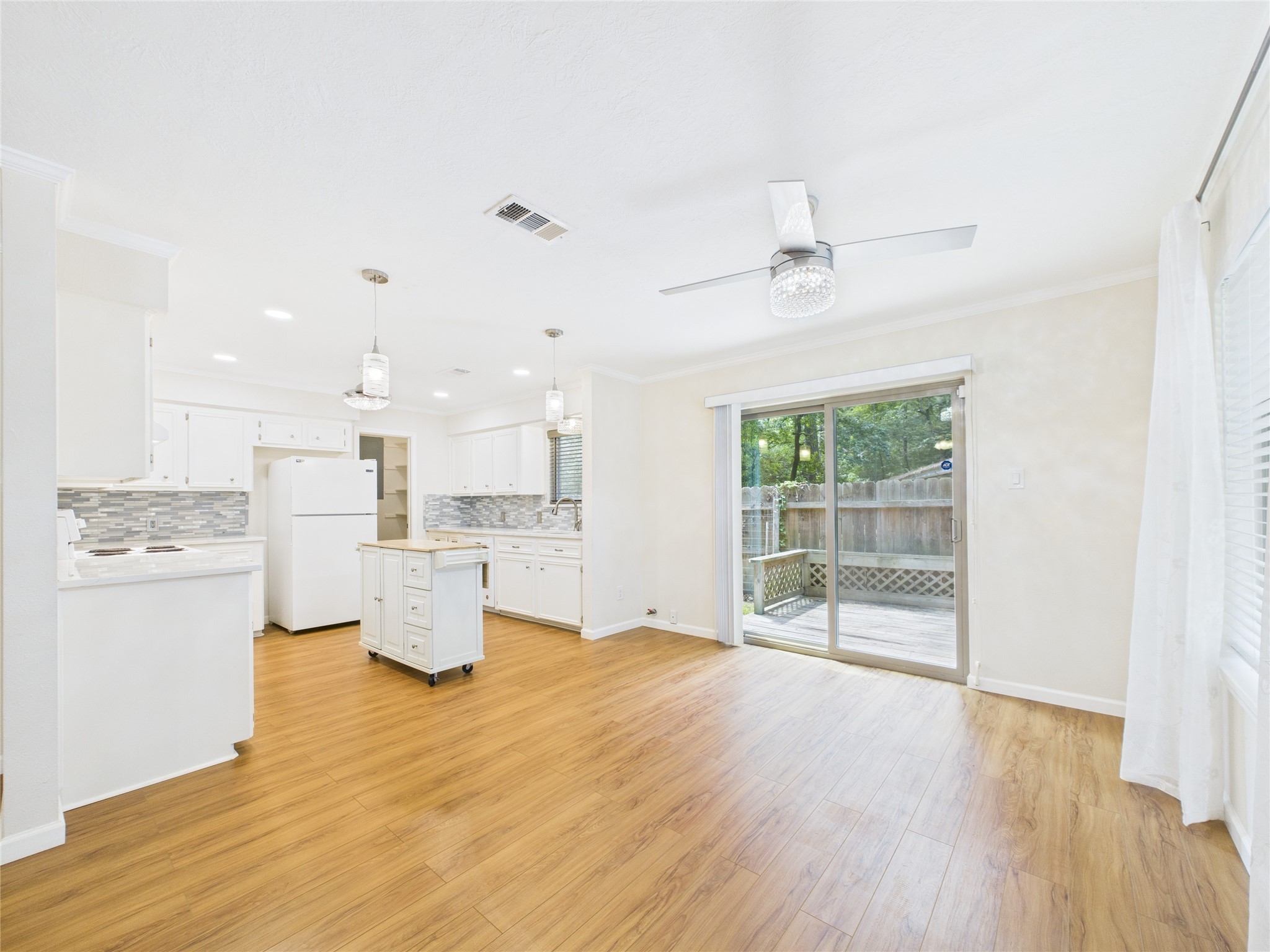 36 Corkwood Trinity, TX 75862 - Photo 11 of 49 a view of kitchen with furniture and wooden floor