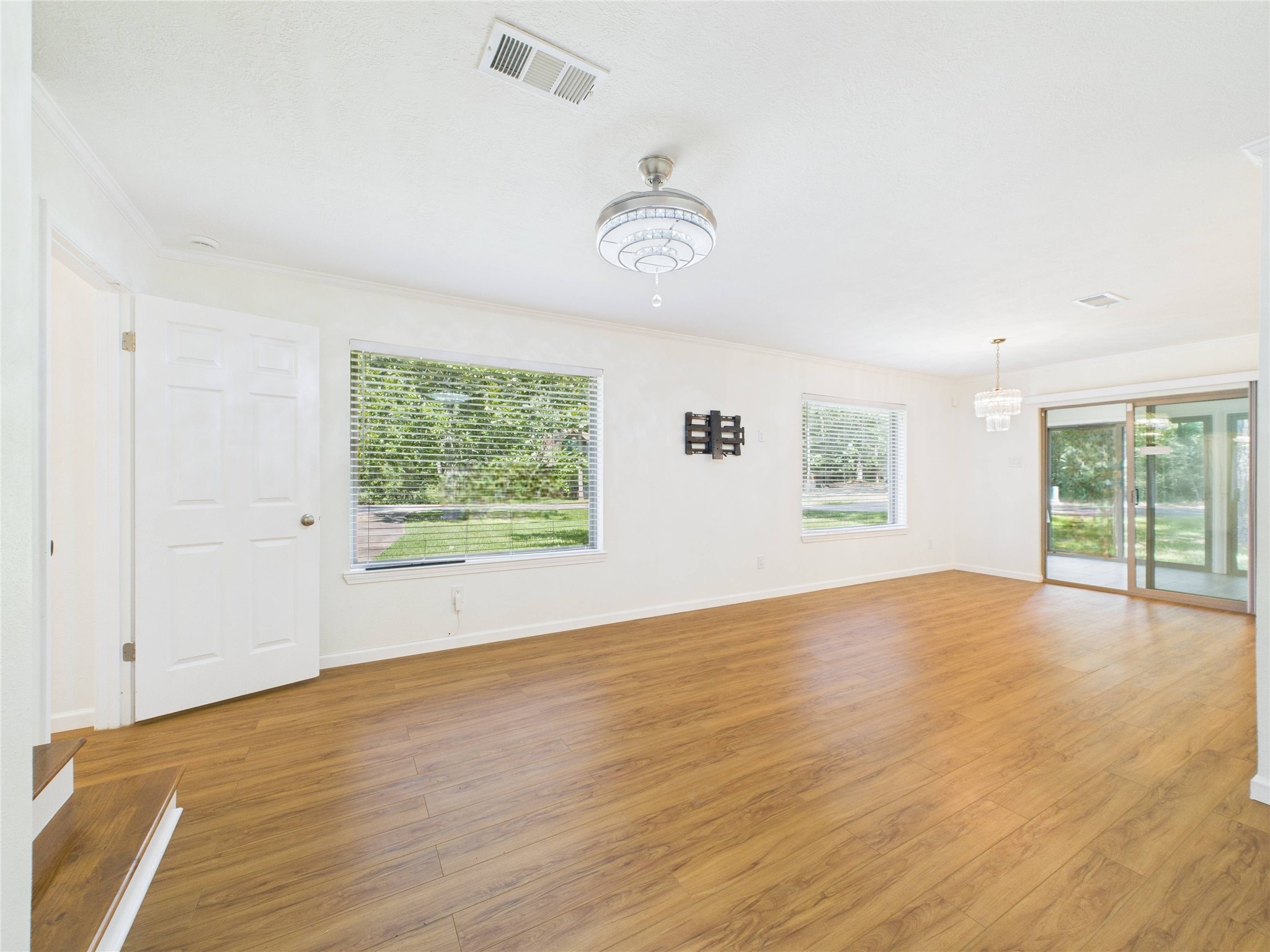 36 Corkwood Trinity, TX 75862 - Photo 29 of 49 Other living area on the left side of the house. Sliding glass door leads to the airconditioned sunroom.