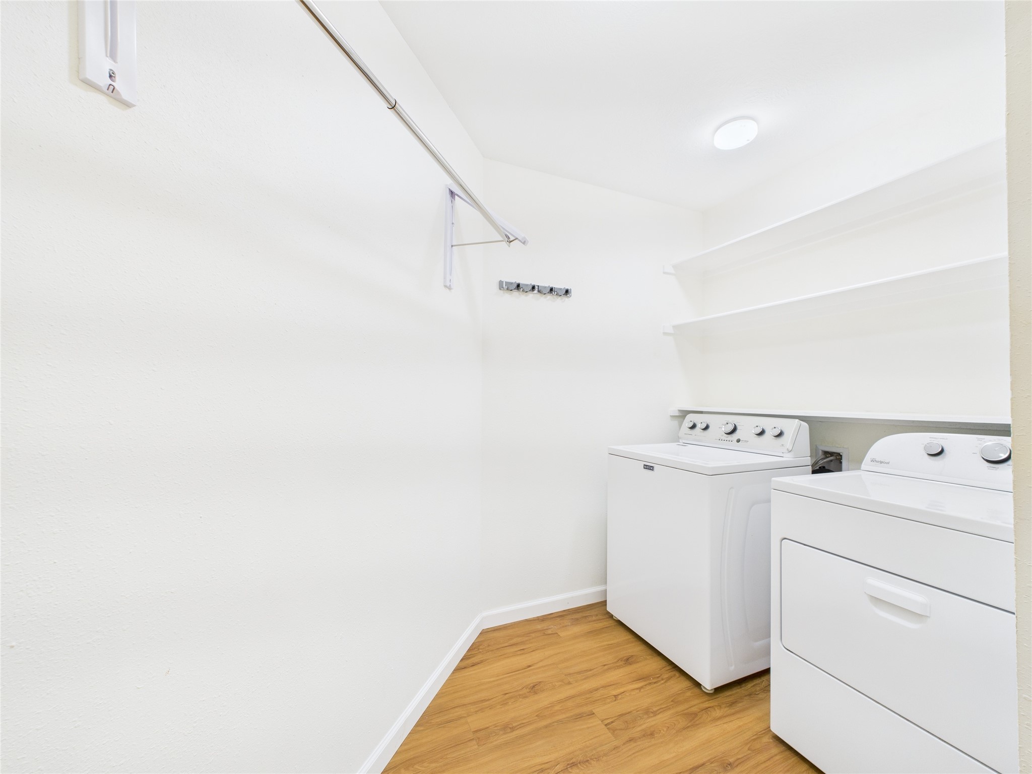 36 Corkwood Trinity, TX 75862 - Photo 39 of 49 a view of storage and utility room with washer and dryer
