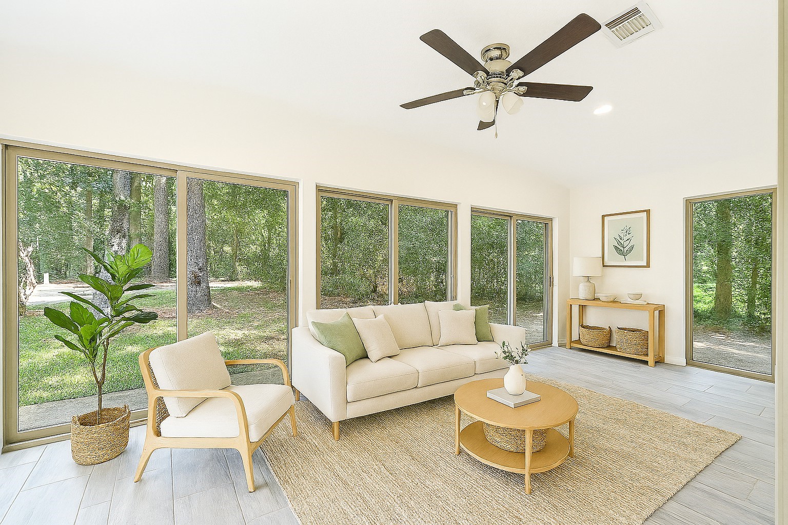 36 Corkwood Trinity, TX 75862 - Photo 43 of 49 a living room with furniture and a large window with wooden floor