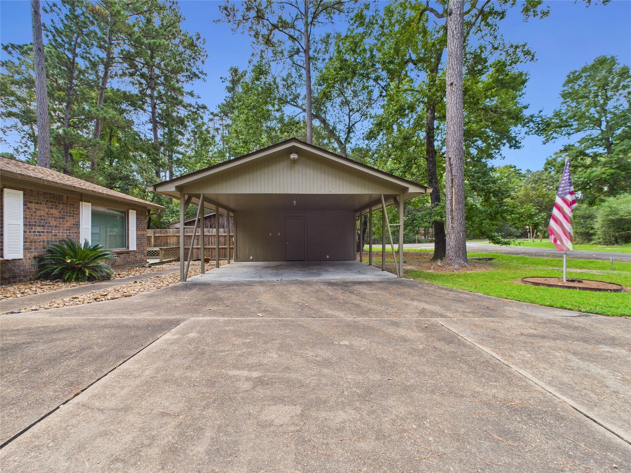 36 Corkwood Trinity, TX 75862 - Photo 6 of 49 a view of a house with a yard and large tree