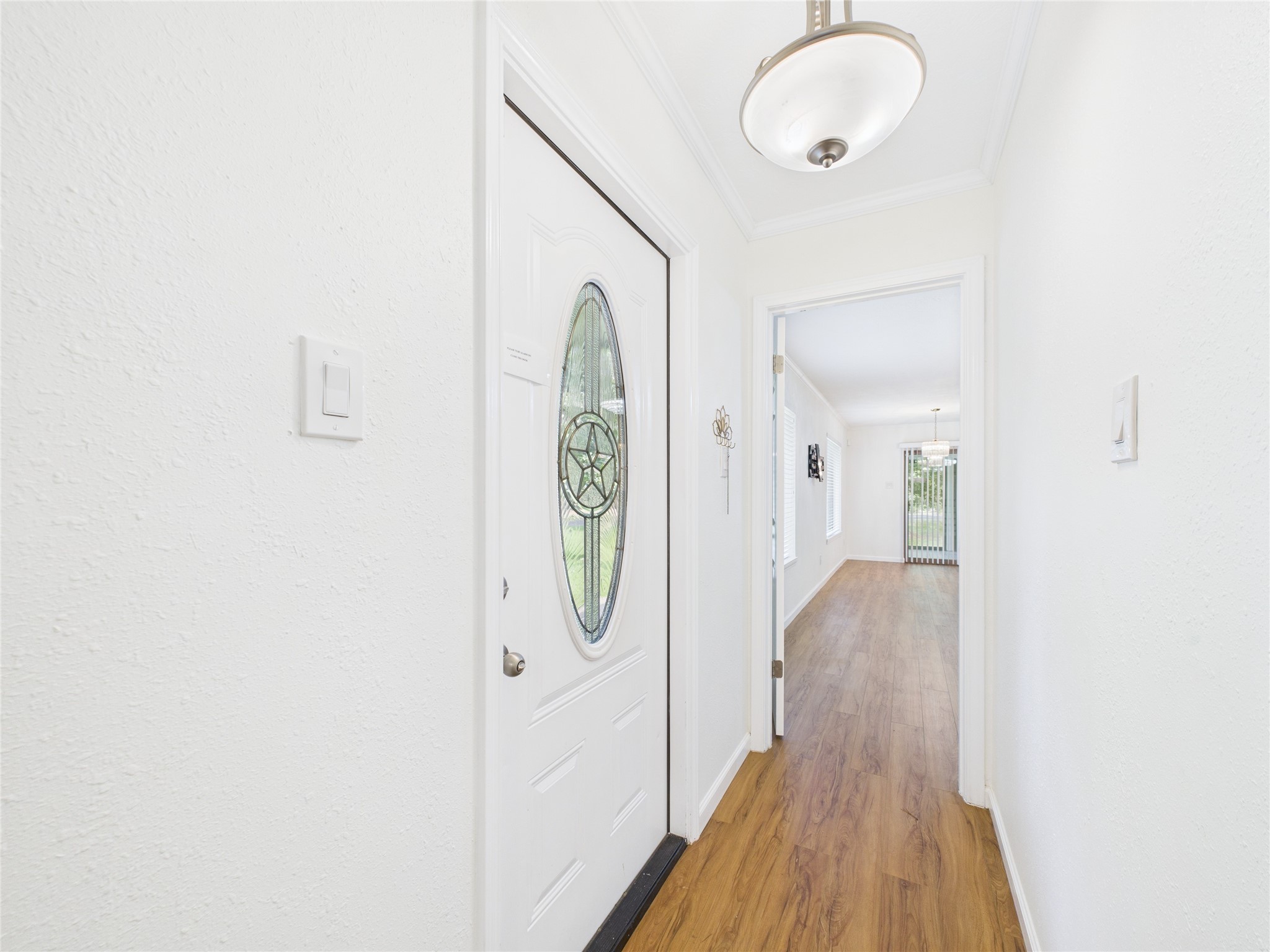 36 Corkwood Trinity, TX 75862 - Photo 9 of 49 a view of a hallway with wooden floor