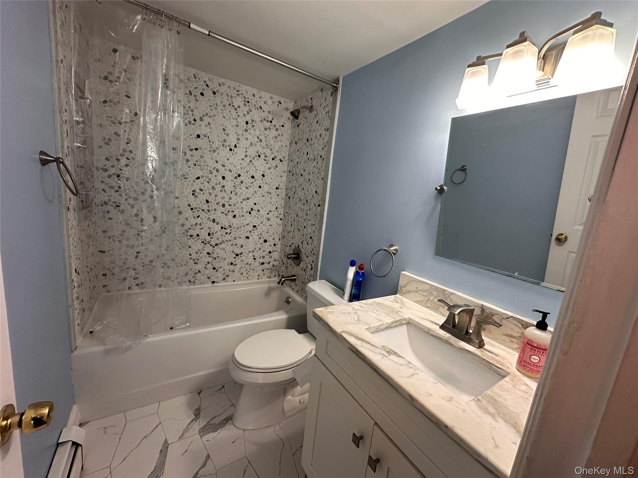 5 Forge Gate Drive, Unit C3 Cold Spring, NY 10516 - Photo 8 of 10 a bathroom with a sink toilet and shower
