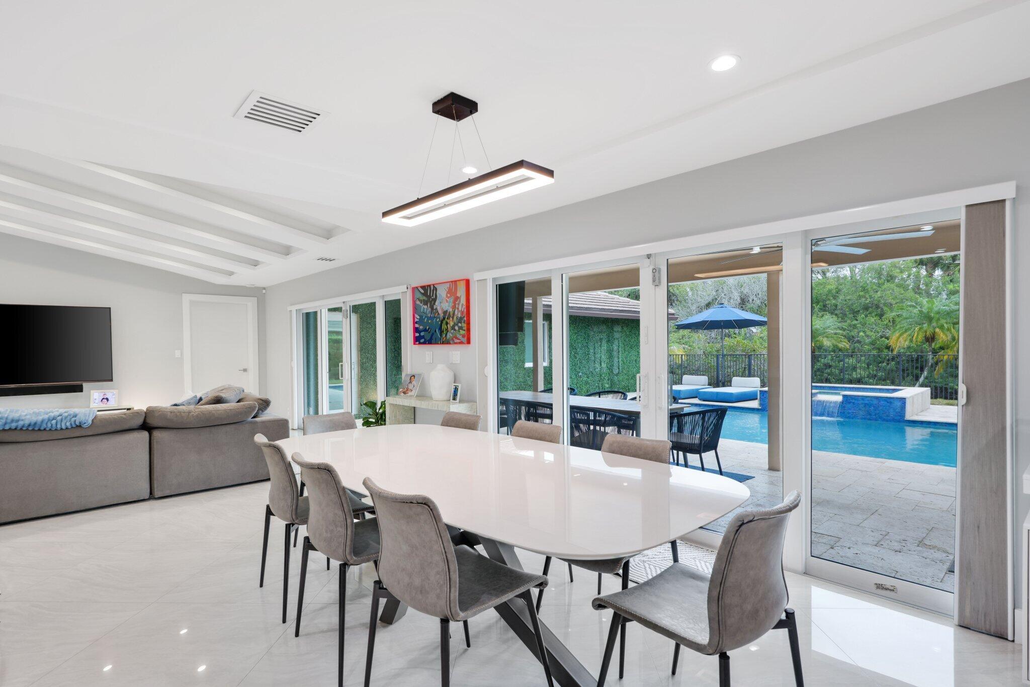 20984 Shady Vista Lane Boca Raton, FL 33428 - Photo 17 of 54 a view of a dining room with furniture window and outside view