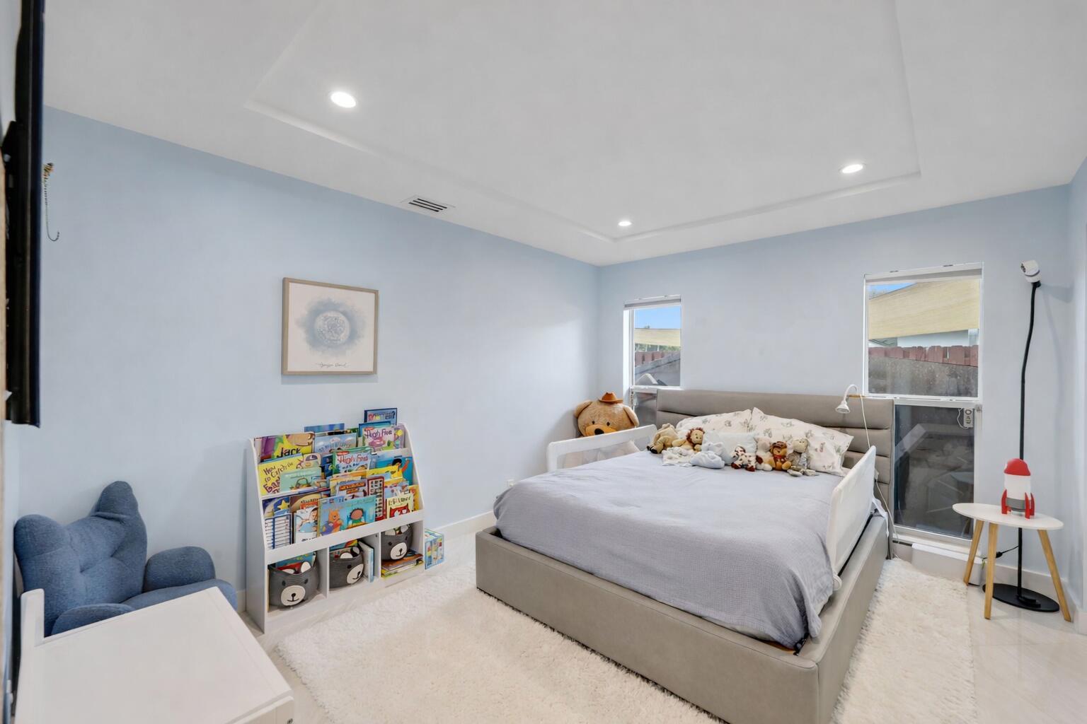 20984 Shady Vista Lane Boca Raton, FL 33428 - Photo 25 of 54 a bedroom with bed and a window