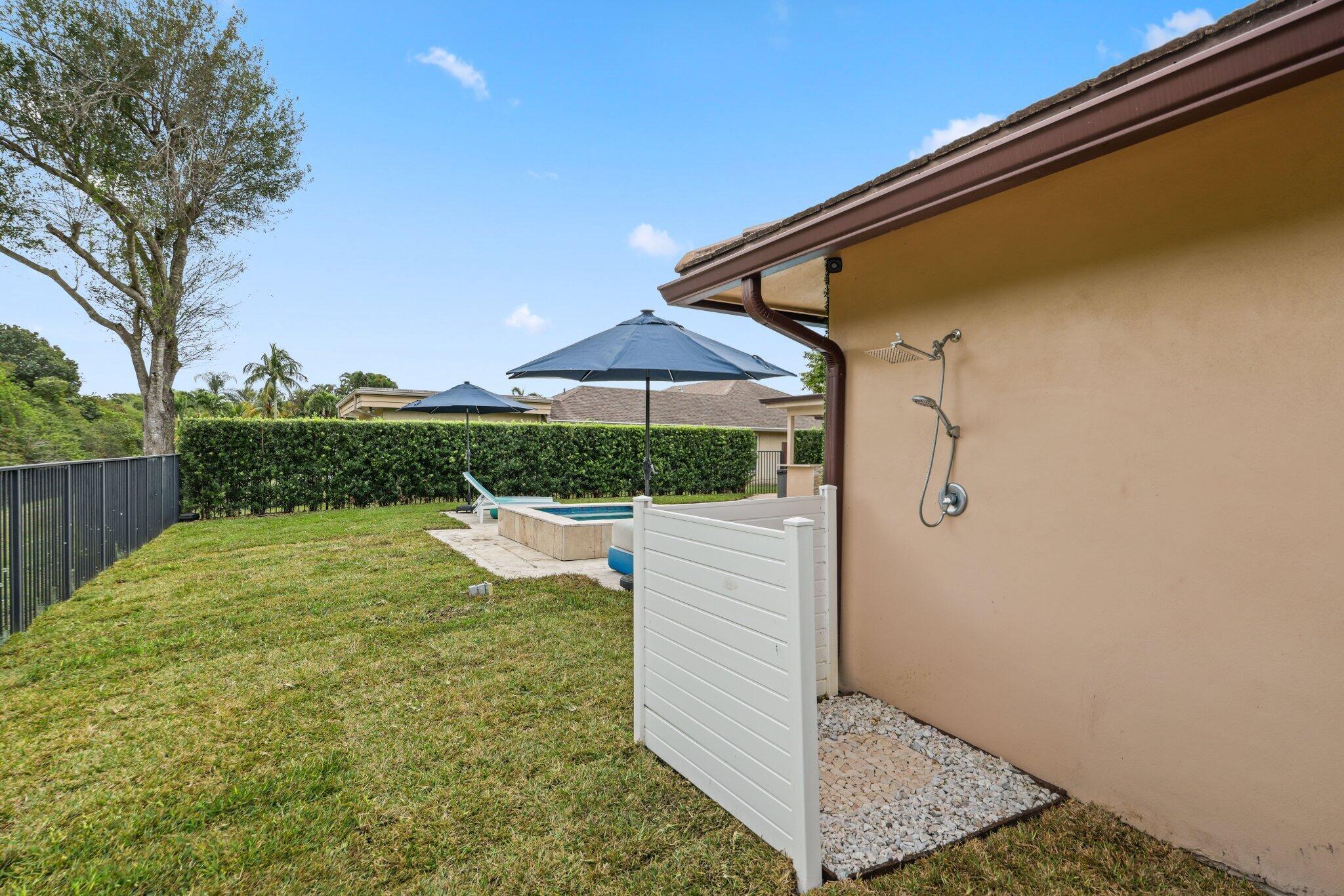 20984 Shady Vista Lane Boca Raton, FL 33428 - Photo 34 of 54 a view of a backyard