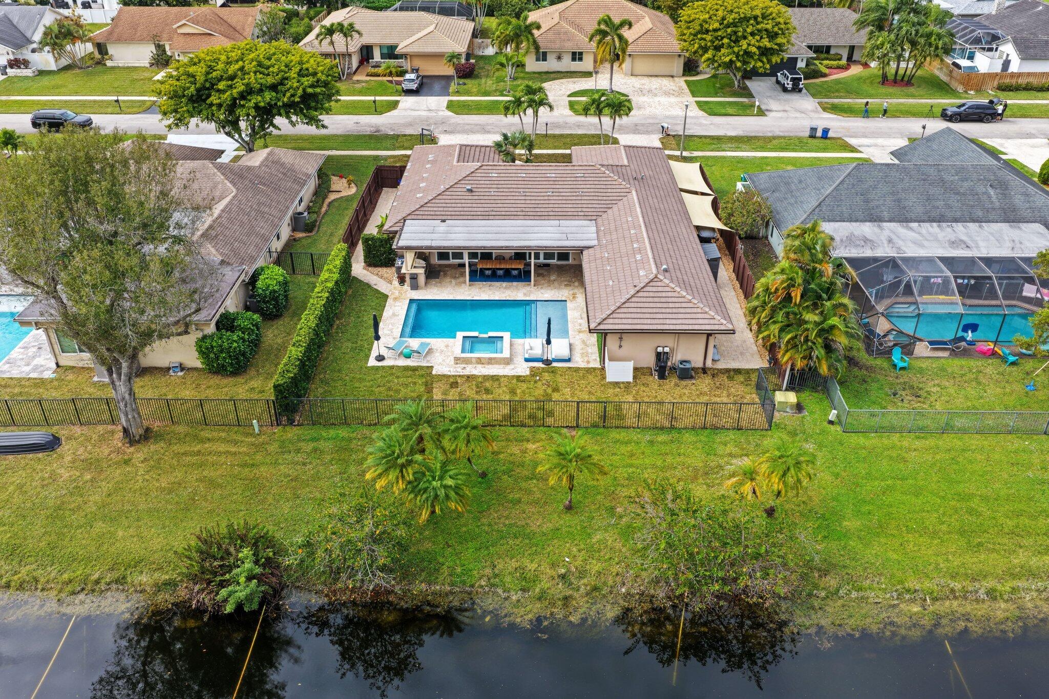 20984 Shady Vista Lane Boca Raton, FL 33428 - Photo 39 of 54 an aerial view of a house with a garden