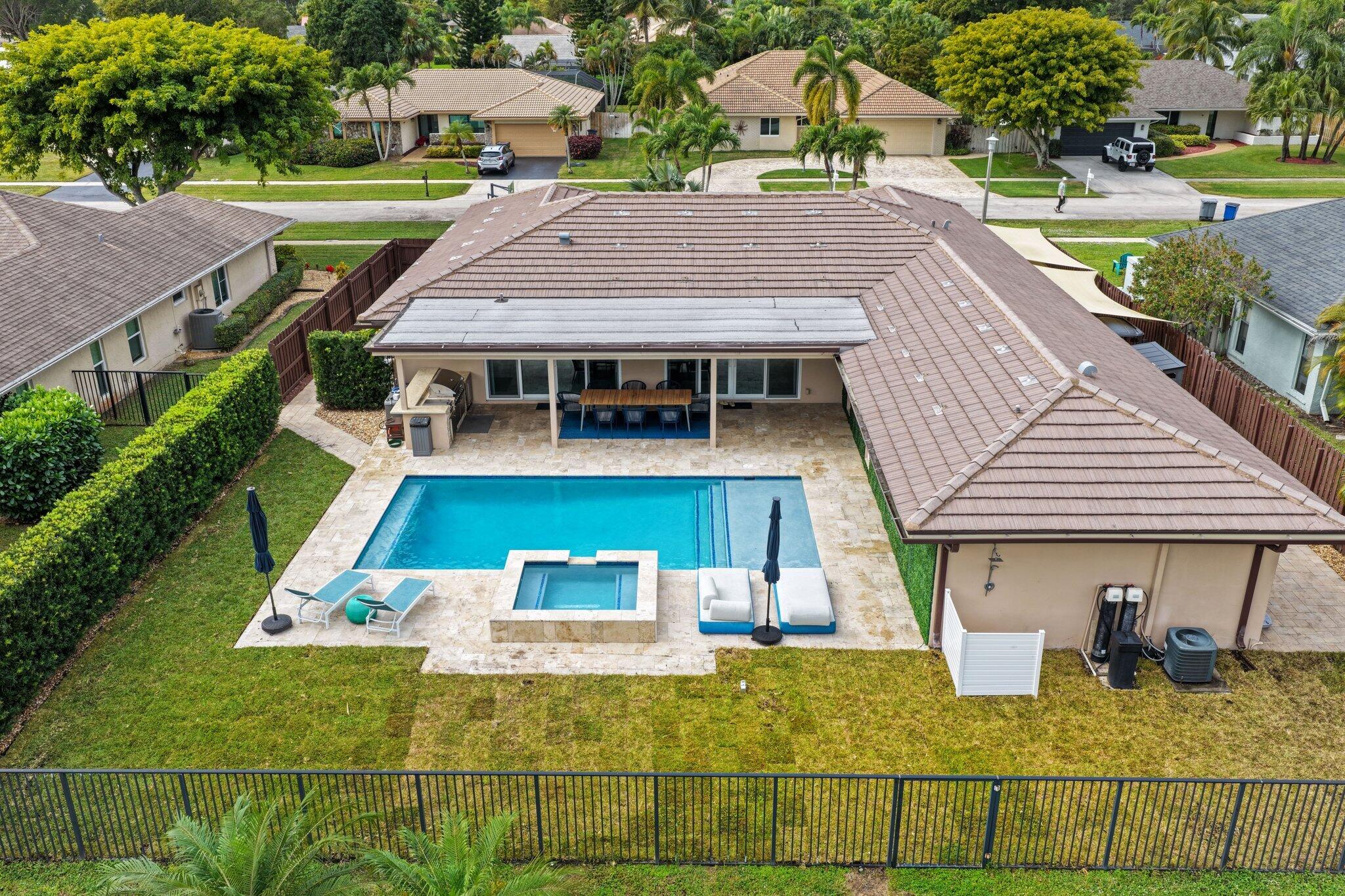 20984 Shady Vista Lane Boca Raton, FL 33428 - Photo 40 of 54 an aerial view of a house with swimming pool garden and patio
