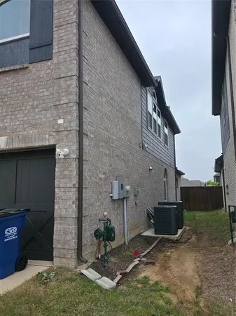 a backyard of a house with seating space