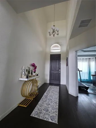 a view of entryway with livingroom
