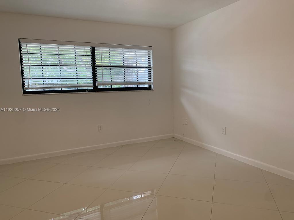 907 Northeast 199th Street, Unit 204 Miami, FL 33179 - Photo 13 of 16