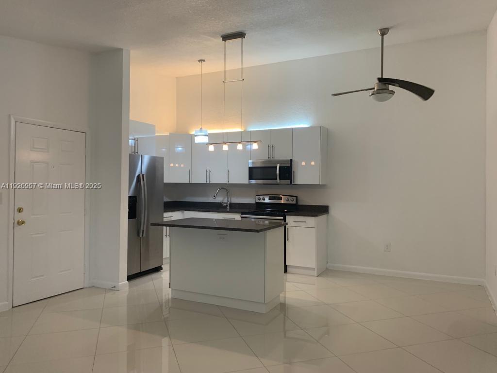 907 Northeast 199th Street, Unit 204 Miami, FL 33179 - Photo 4 of 16