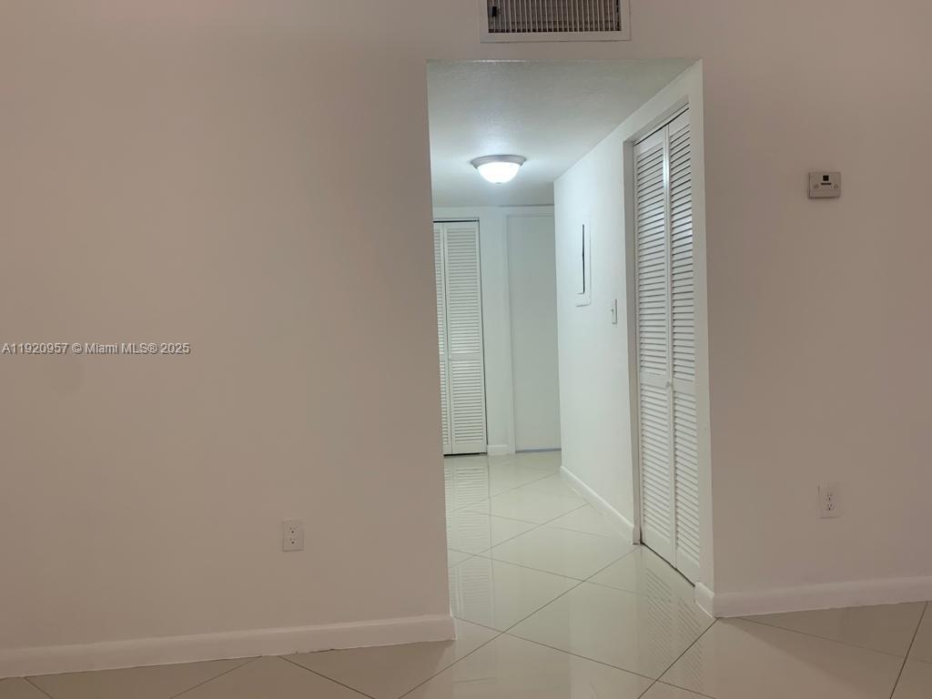 907 Northeast 199th Street, Unit 204 Miami, FL 33179 - Photo 8 of 16