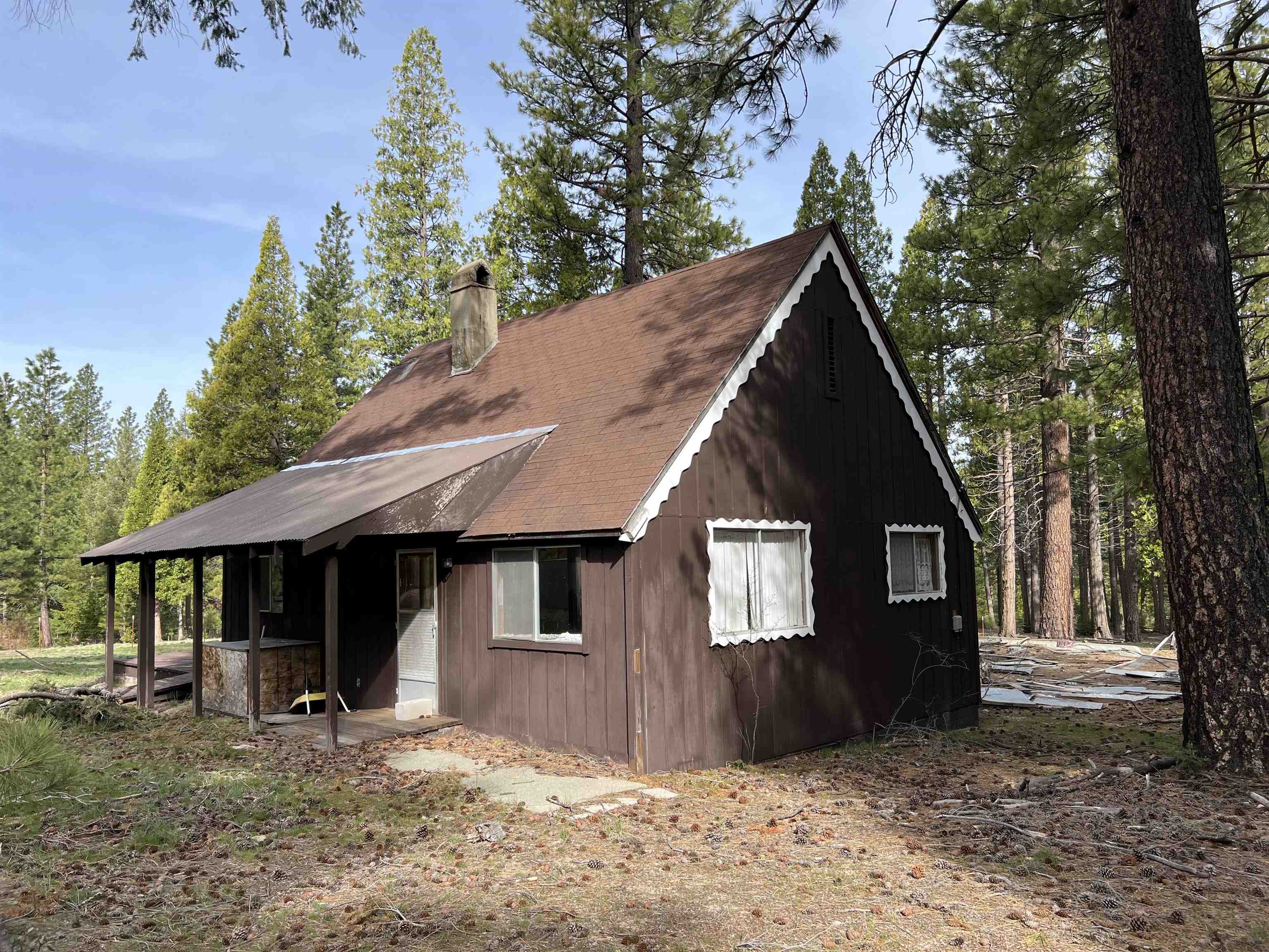 475 Old Hatchery Road Clio, CA 96106 - Photo 11 of 14 a front view of a house with garden