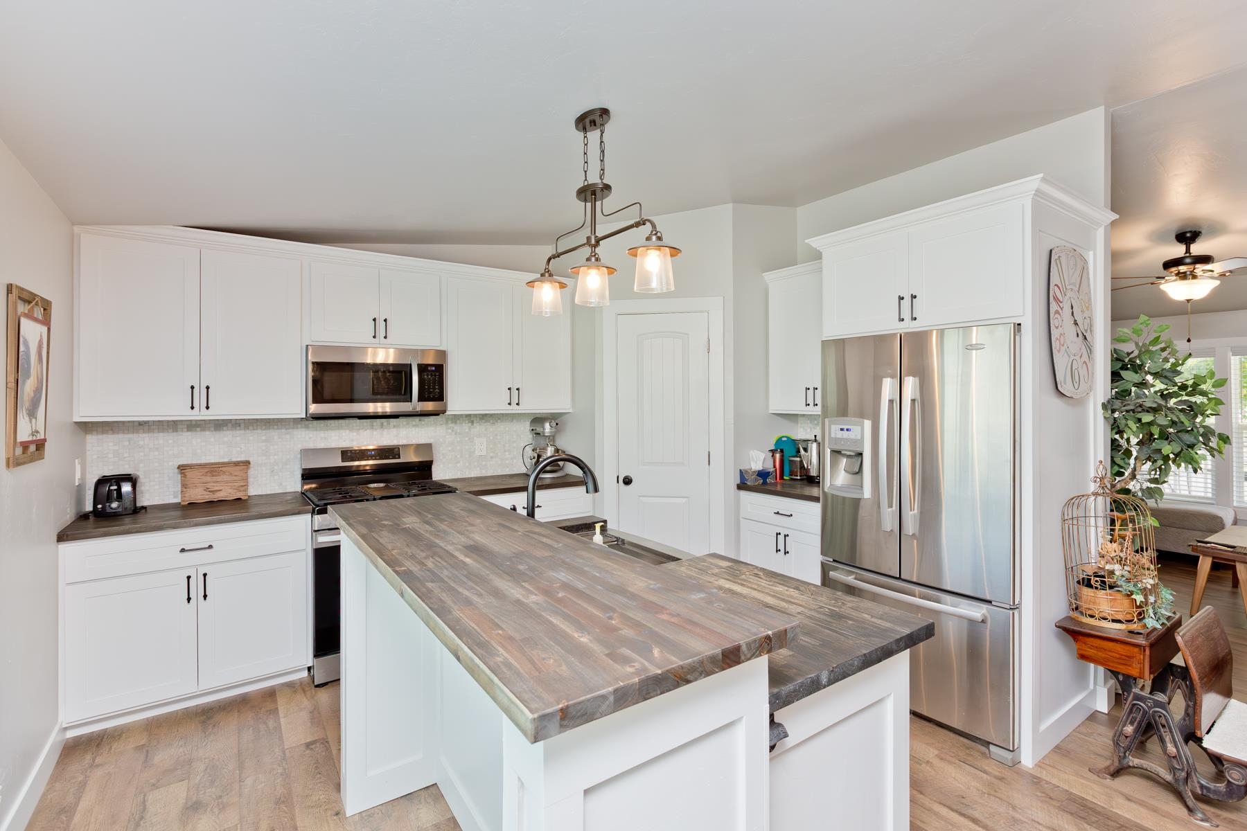 435 32 Road, Unit 601 Clifton, CO 81520 - Photo 15 of 38 a kitchen with stainless steel appliances granite countertop a sink stove refrigerator and cabinets