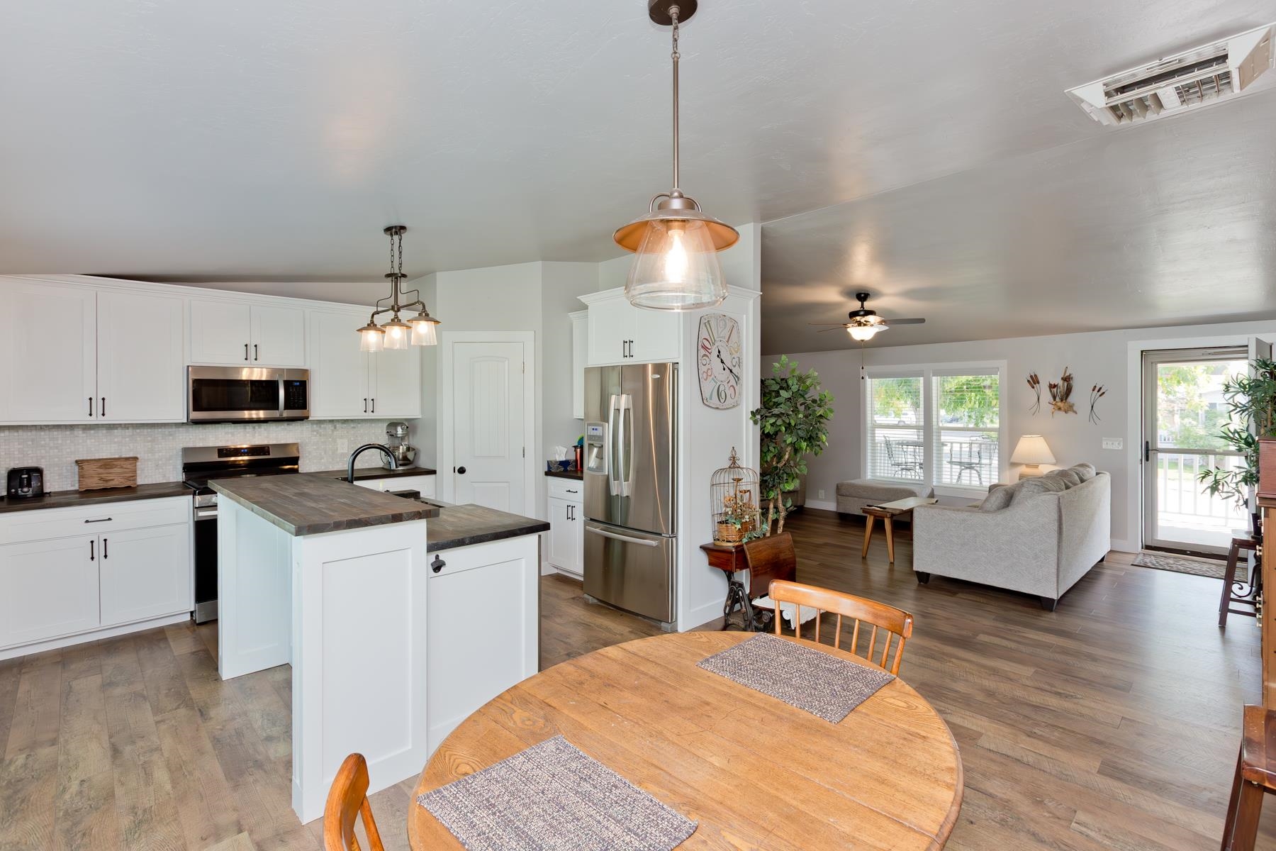 435 32 Road, Unit 601 Clifton, CO 81520 - Photo 17 of 38 a kitchen with stainless steel appliances kitchen island a refrigerator and a stove