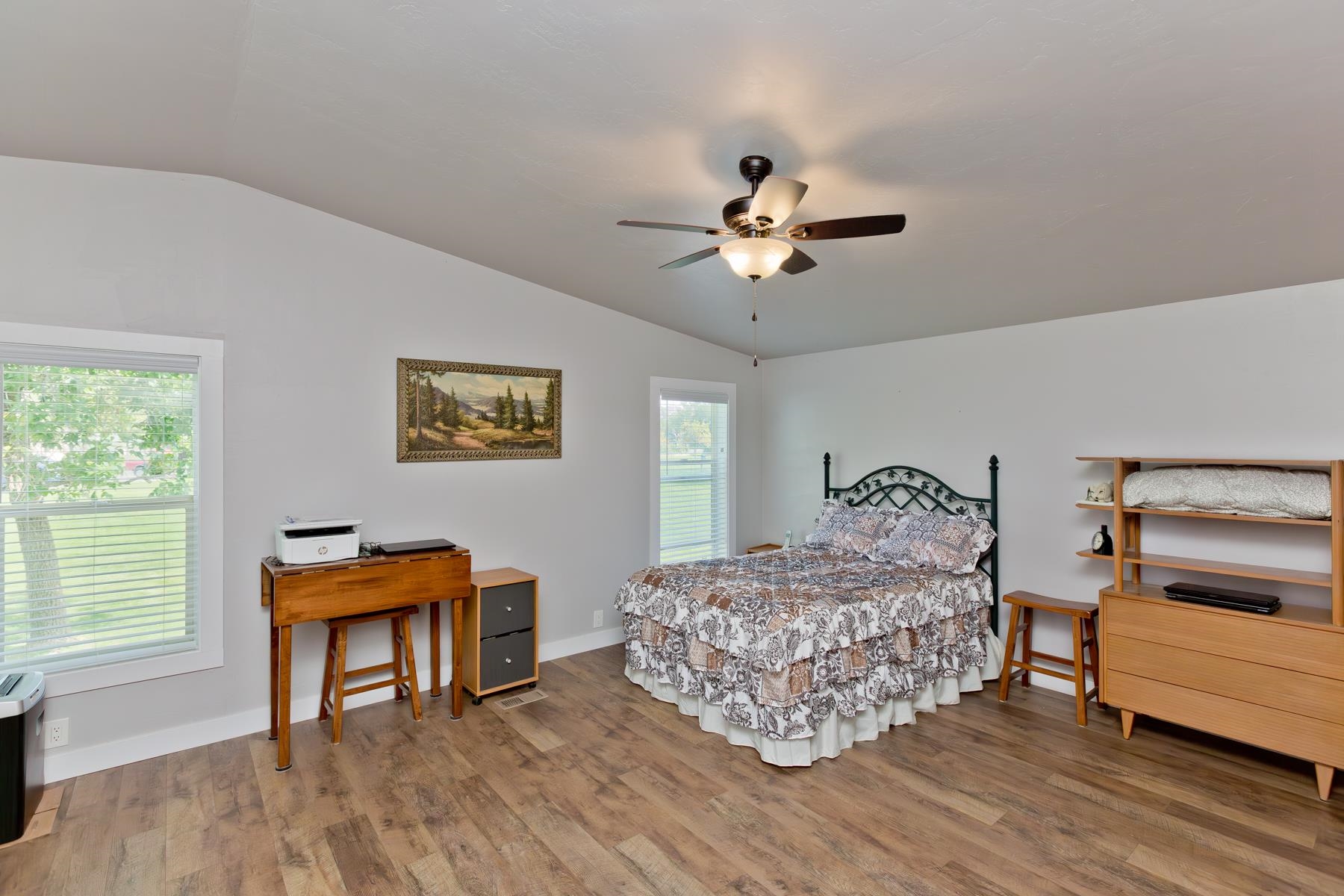 435 32 Road, Unit 601 Clifton, CO 81520 - Photo 20 of 38 a bedroom with a bed and a chandelier