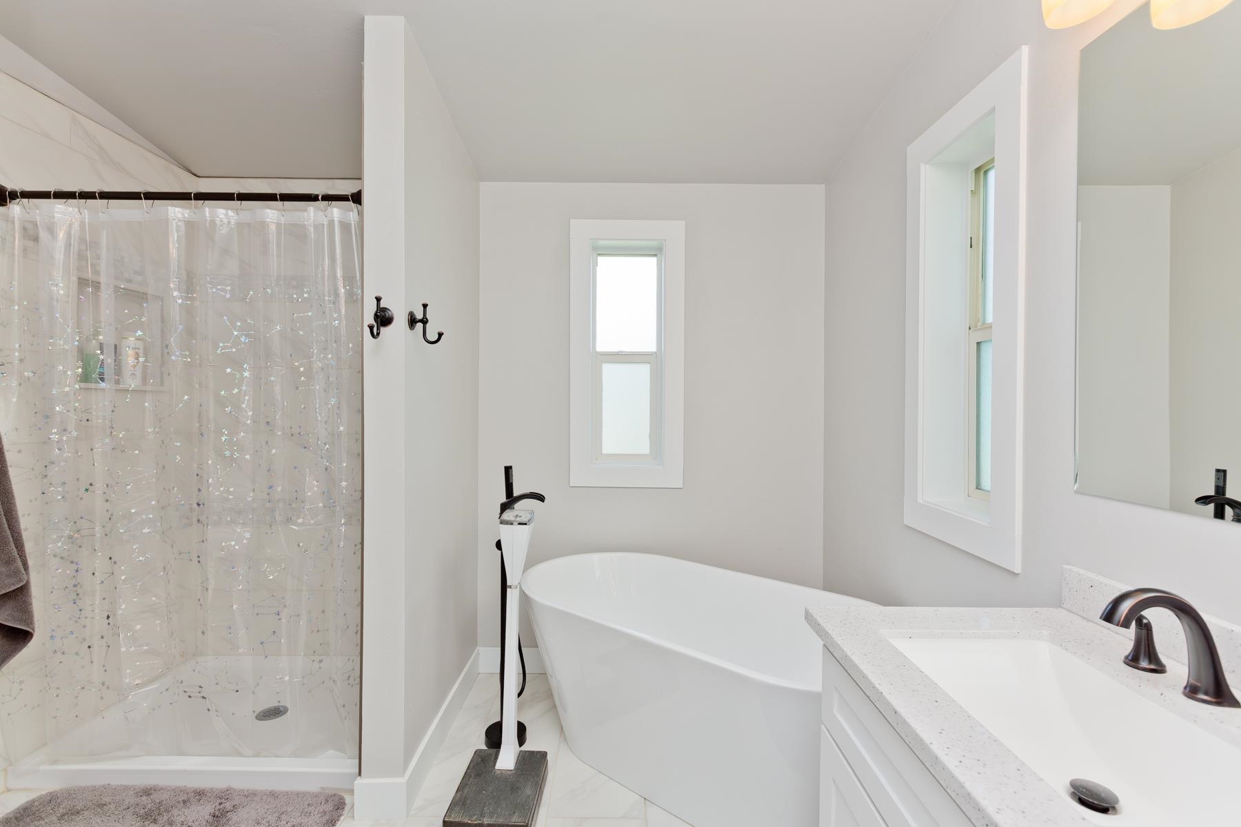 435 32 Road, Unit 601 Clifton, CO 81520 - Photo 21 of 38 a bathroom with a sink and a shower