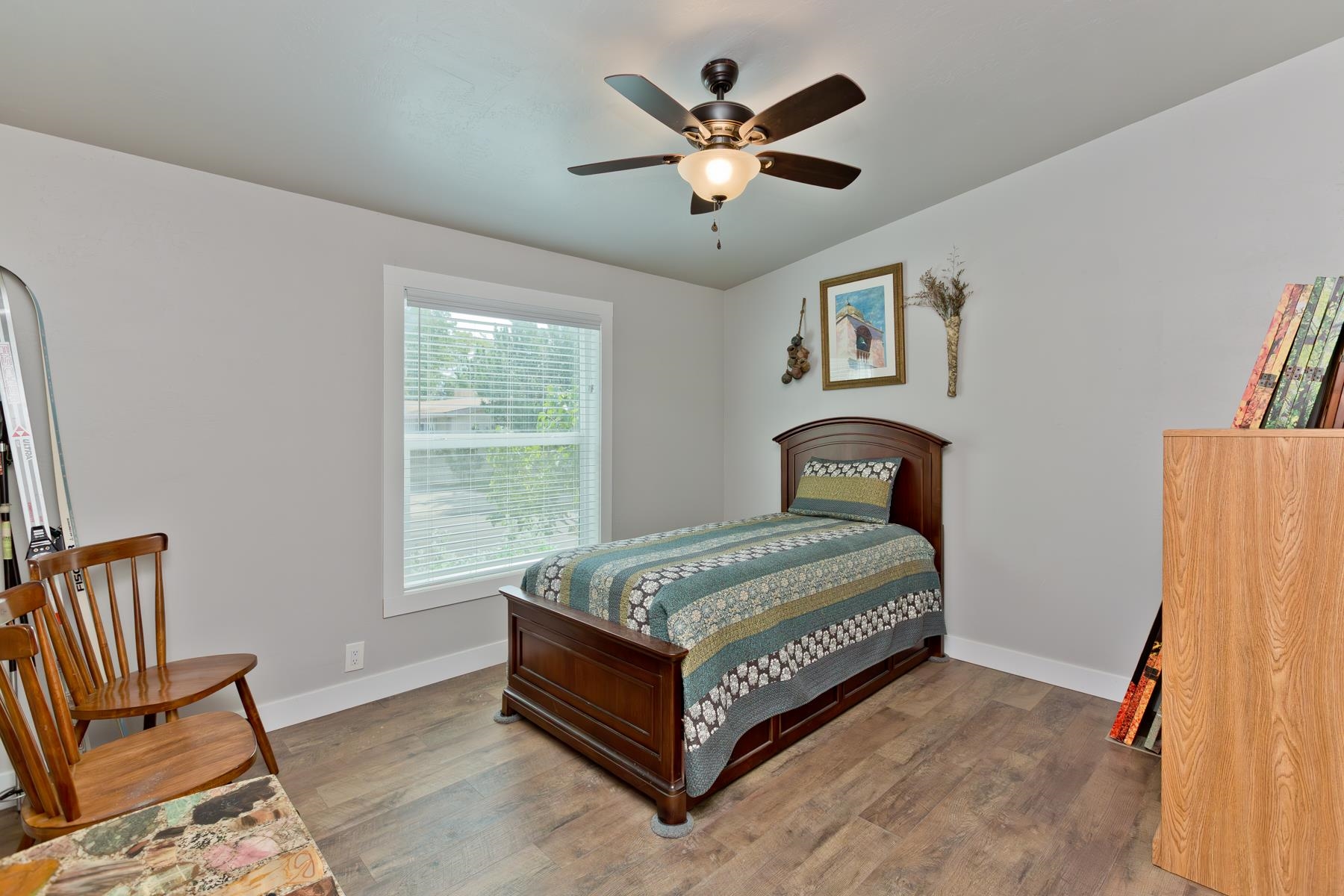 435 32 Road, Unit 601 Clifton, CO 81520 - Photo 24 of 38 a bed sitting in a bedroom next to a window