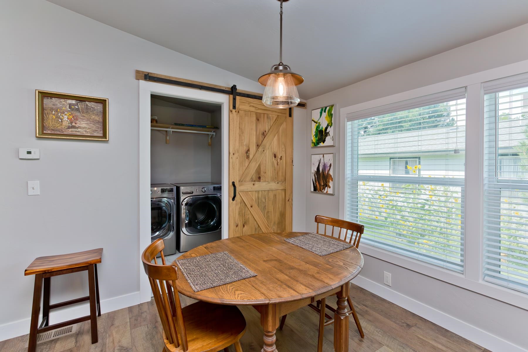 435 32 Road, Unit 601 Clifton, CO 81520 - Photo 28 of 38 a view of a dining room with furniture window and wooden floor