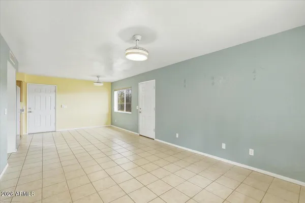 a view of an empty room and window