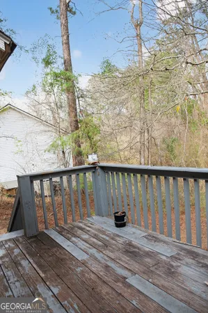 a view of balcony with wooden floor and outdoor space
