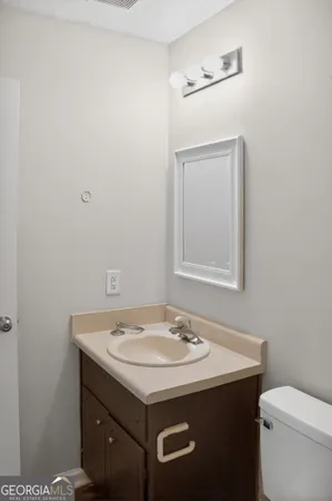 a bathroom with a sink and a toilet