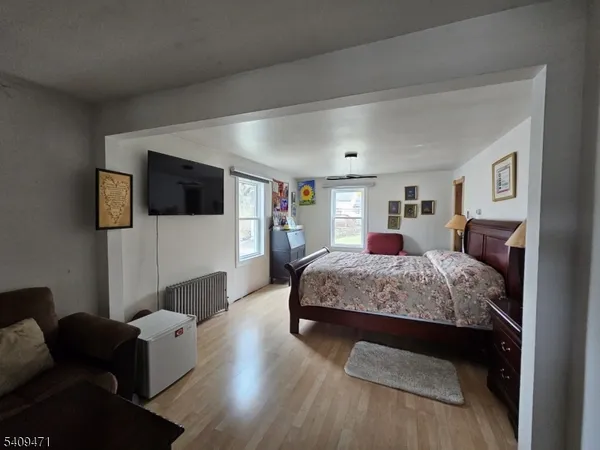 a living room with furniture and a gate