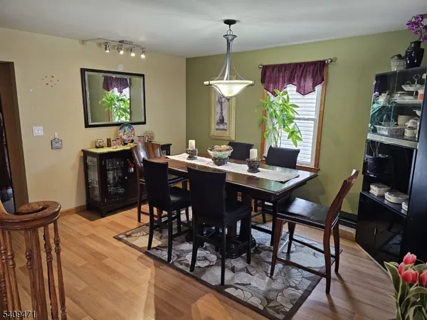 a view of a dining room with furniture