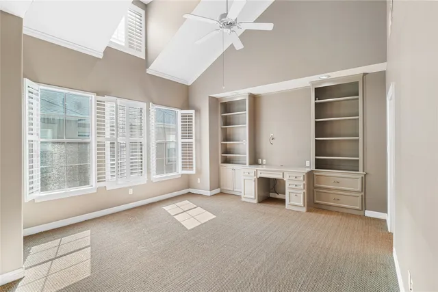 a view of workspace with furniture and windows