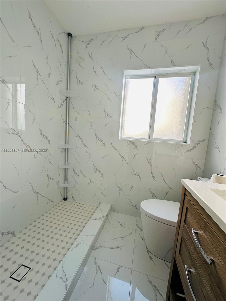 3052 Southwest 6th Street Miami, FL 33135 - Photo 15 of 15 a bathroom with a sink toilet and shower