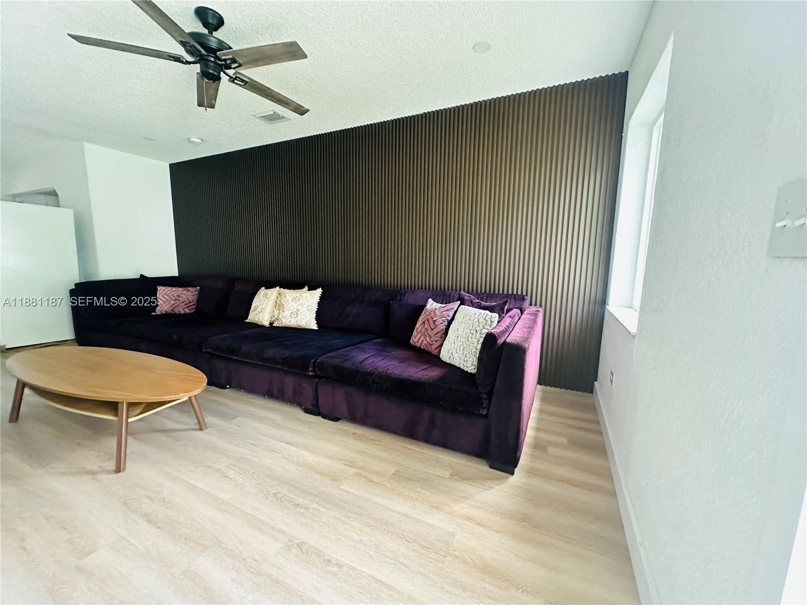 3052 Southwest 6th Street Miami, FL 33135 - Photo 8 of 15 a living room with furniture