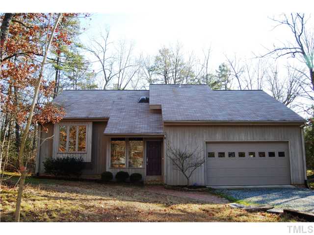 3919 Swarthmore Road Durham, NC 27707 - Photo 1 of 24 The home sits back from the road and features a wooded area in front yard.
