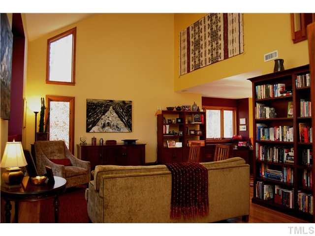 3919 Swarthmore Road Durham, NC 27707 - Photo 3 of 24 Living Room features hardwood floors and soaring cathedral ceilings.