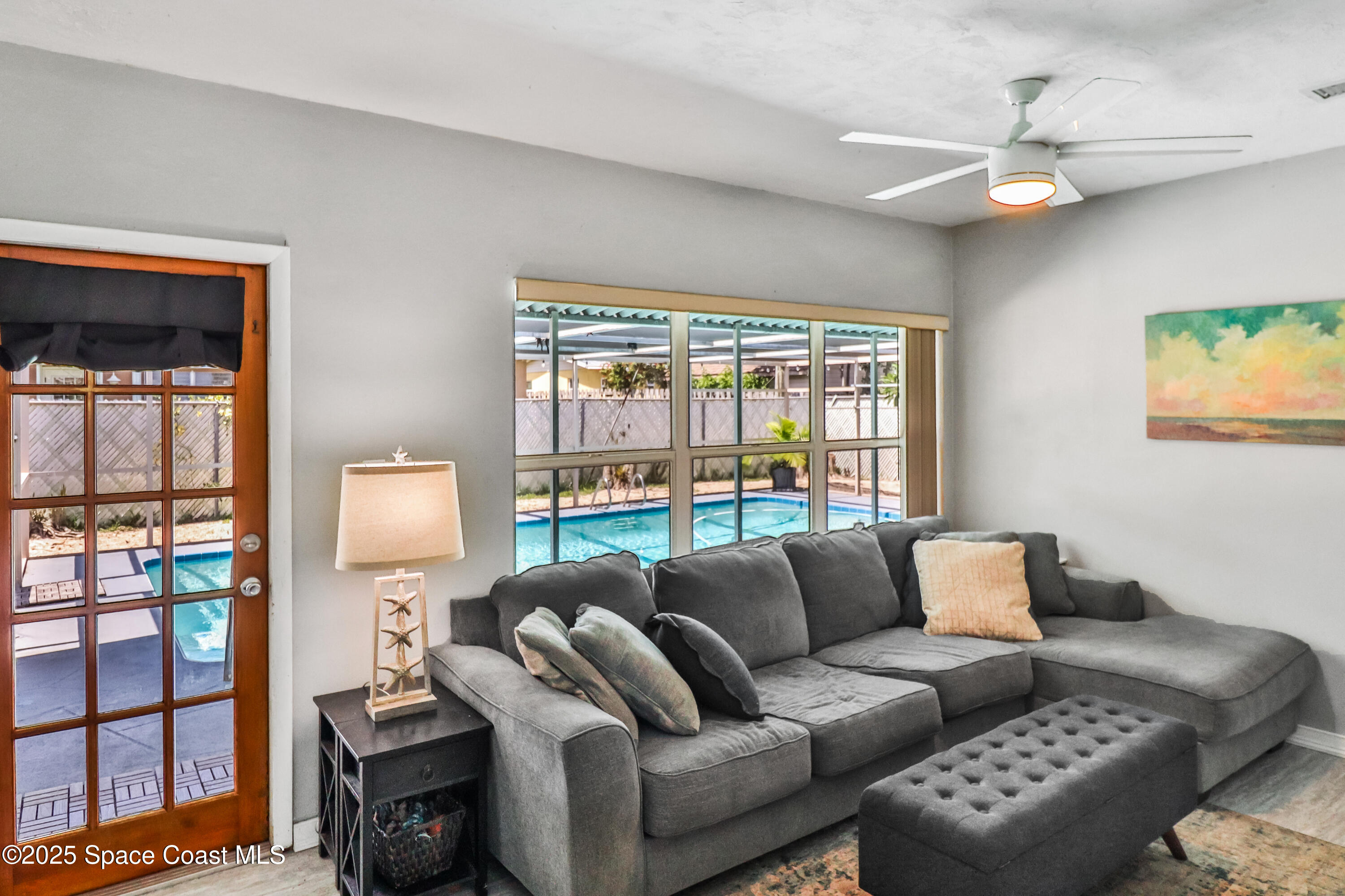 348 Berkeley Street Satellite Beach, FL 32937 - Photo 17 of 46 a living room with furniture